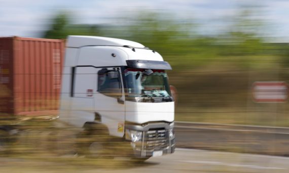 a truck driving on a road